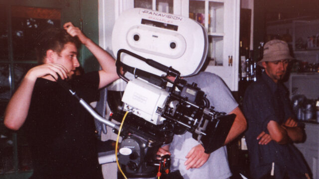 Author scratching his head behind a Panavision Panaflex Platinum — this very camerawas used on Season I of the "Sopranos".