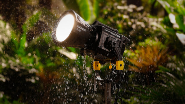 Godox KNOWLED MG1200Bi being splashed with water. Image credit: Godox