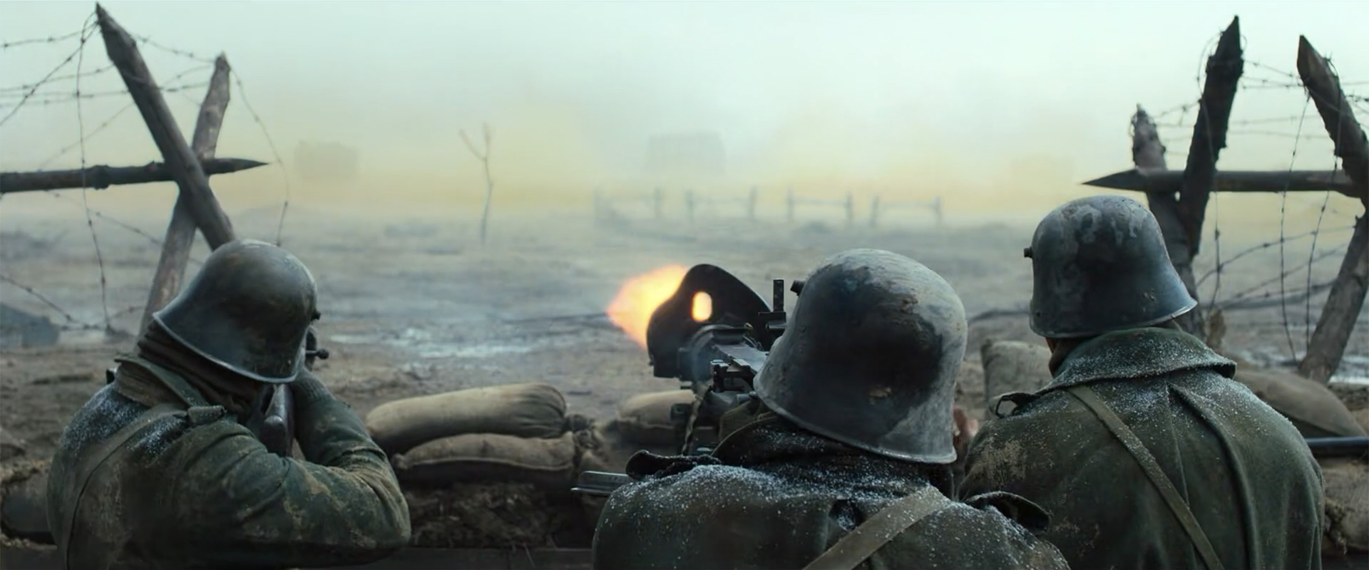 Tanks emerge from the yellow smoke, immersive camera on All Quiet on the Western Front.