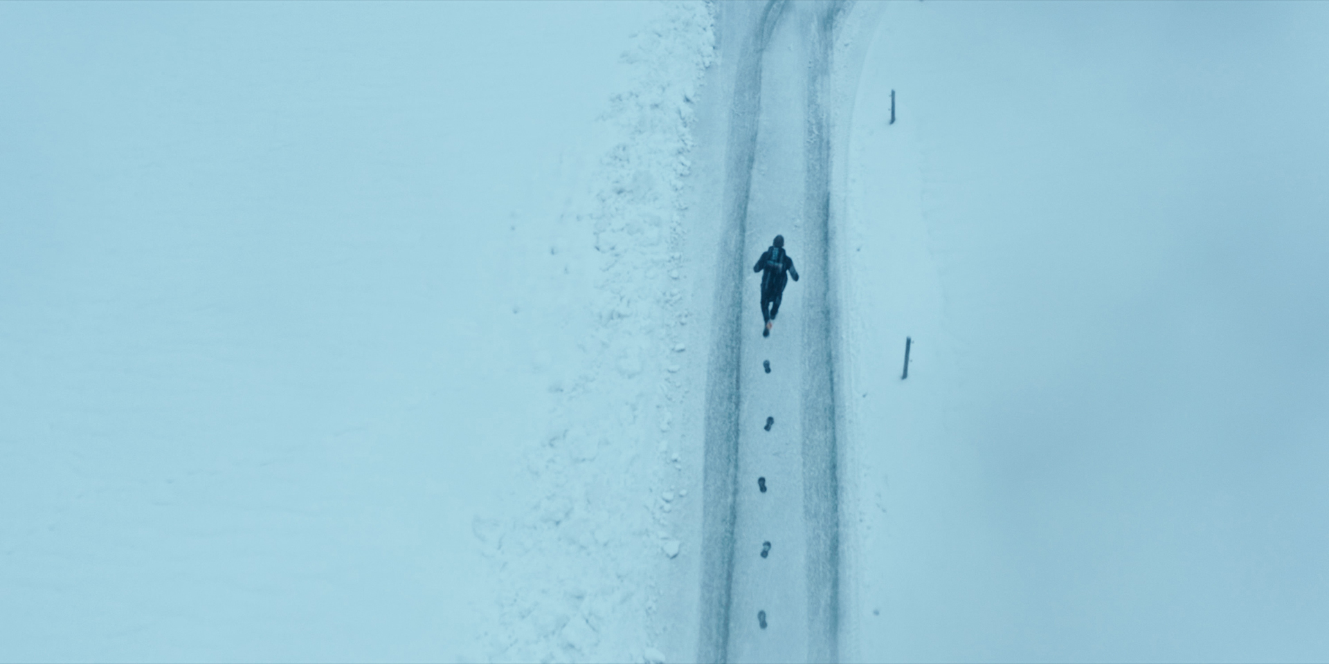 Making of the Navalny Documentary - Navalny runs in the snowy forest, captured from the drone
