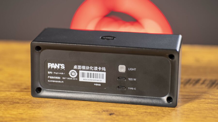 Backside of Pan's Workflow Station Professional Card Reader Hub - a 100W output next to its USB-C connector. Image credit: CineD