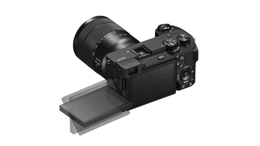 Sony a6700 rear of the camera with various-angle LCD flipped out and lens attached