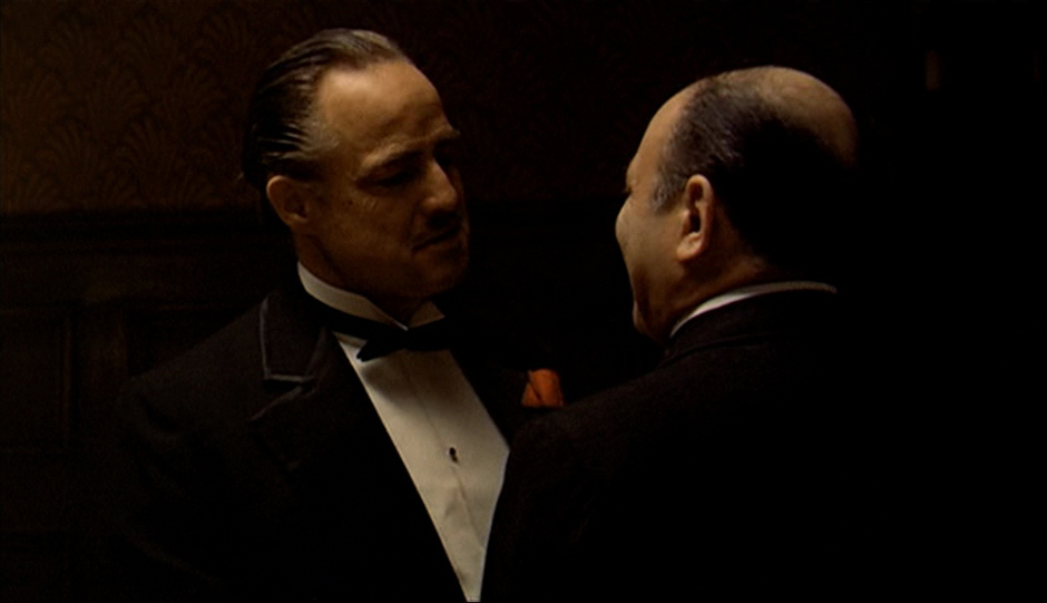 cinematography for directors - a rather dark film still from "The Godfather"