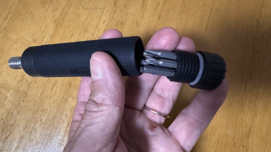 The tripod head handle. Too short and straight, but it has a seven-option screwdrive