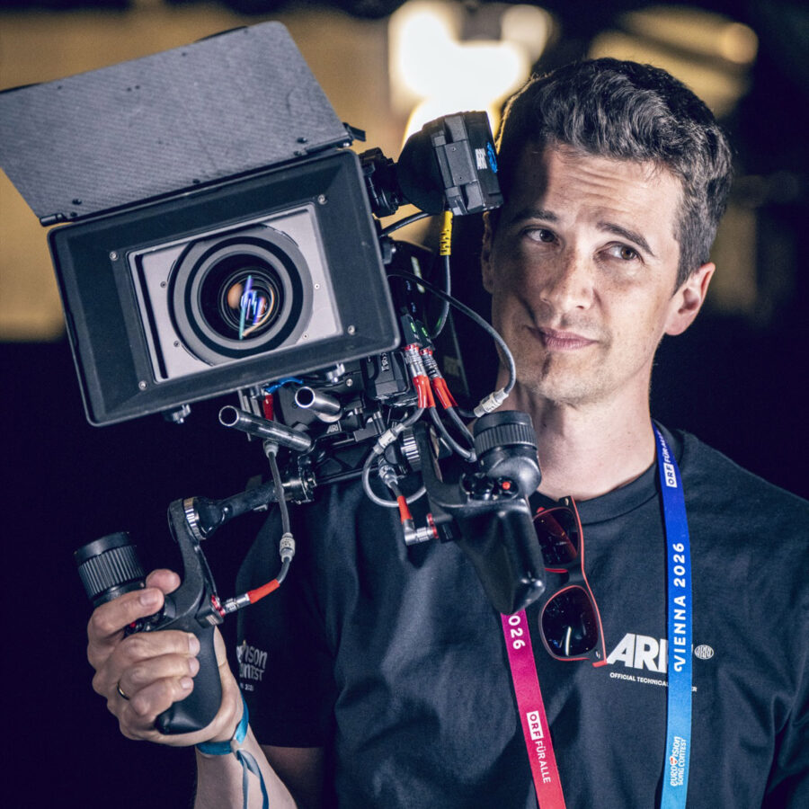 Director of Photography Nino Leitner filming the behind-the-scenes at Eurovision 2026 with an ALEXA 35 Extreme. Image credit: Stefan Klinge / Riedel Communications