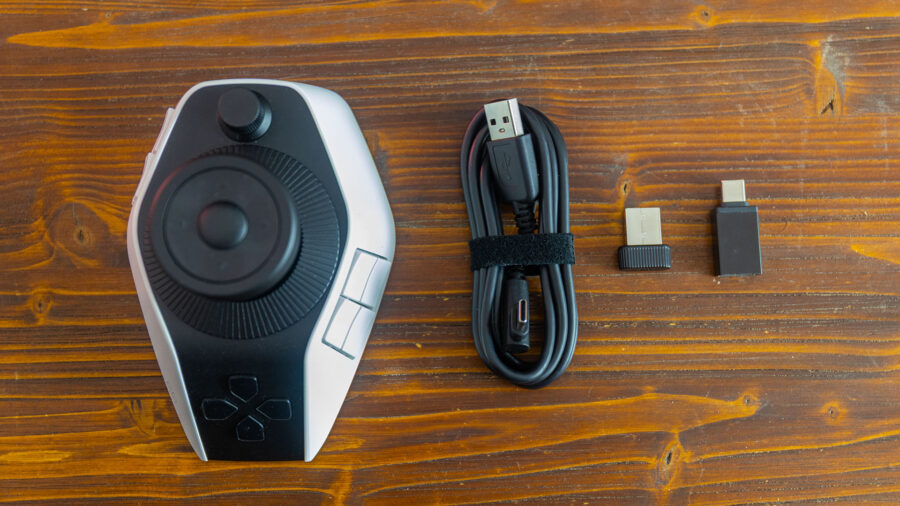 The XPPen Pilot Pro and included cable, adapter, and dongle